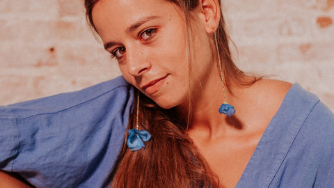 long blue earrings with preserved flower