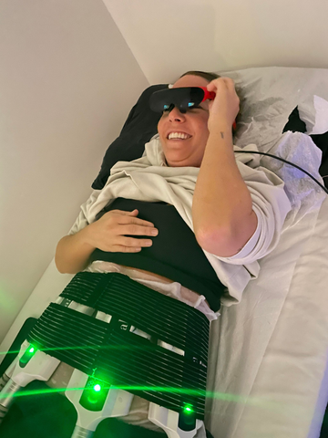 A woman using Rokid Air smart AI glasses while doing treatments