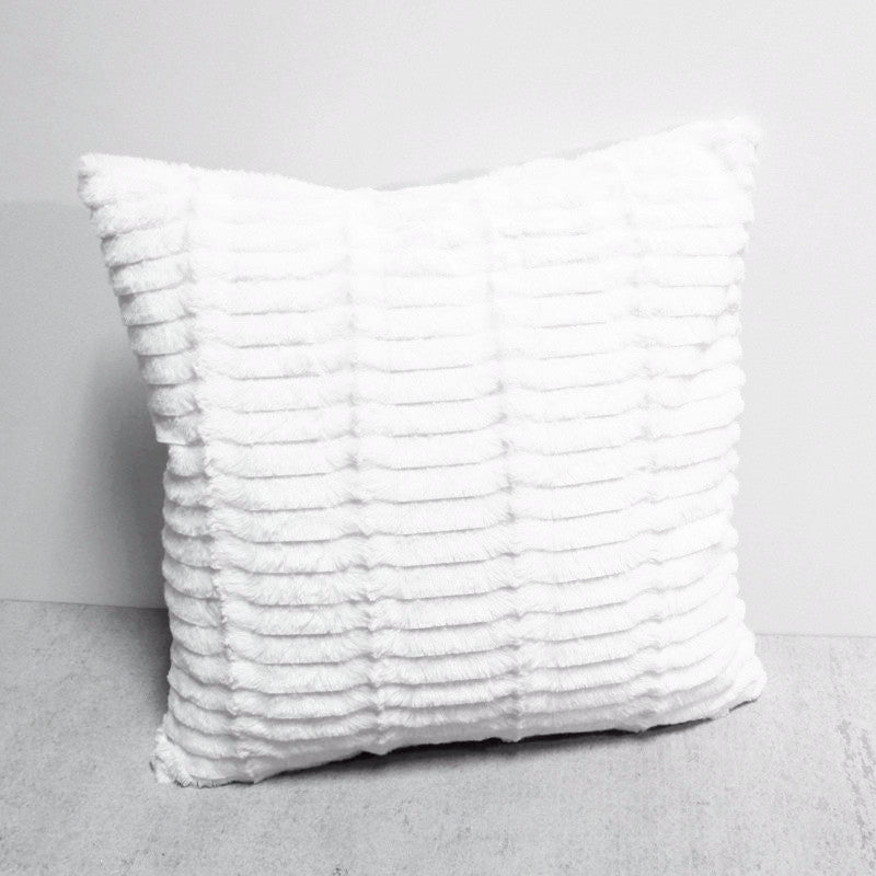 white fuzzy pillow