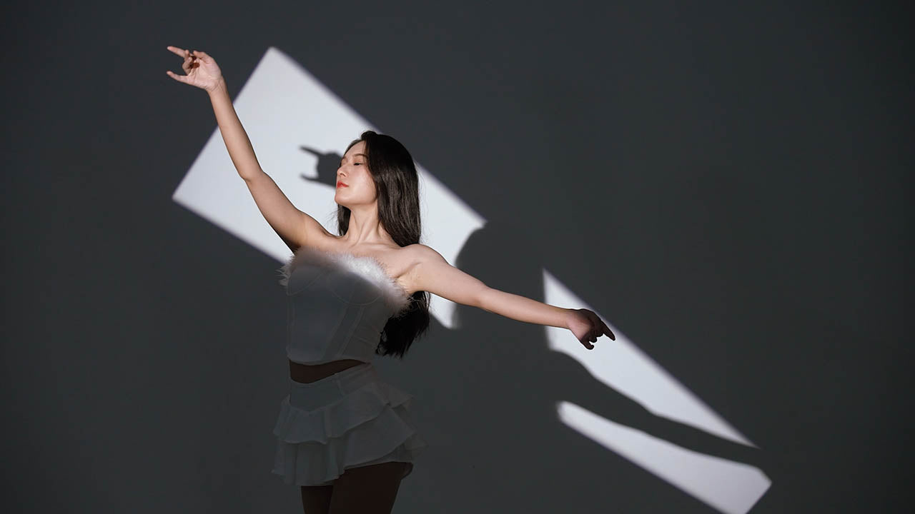 The BLP's Built-in shutter blades being used to project a shape onto a dancer