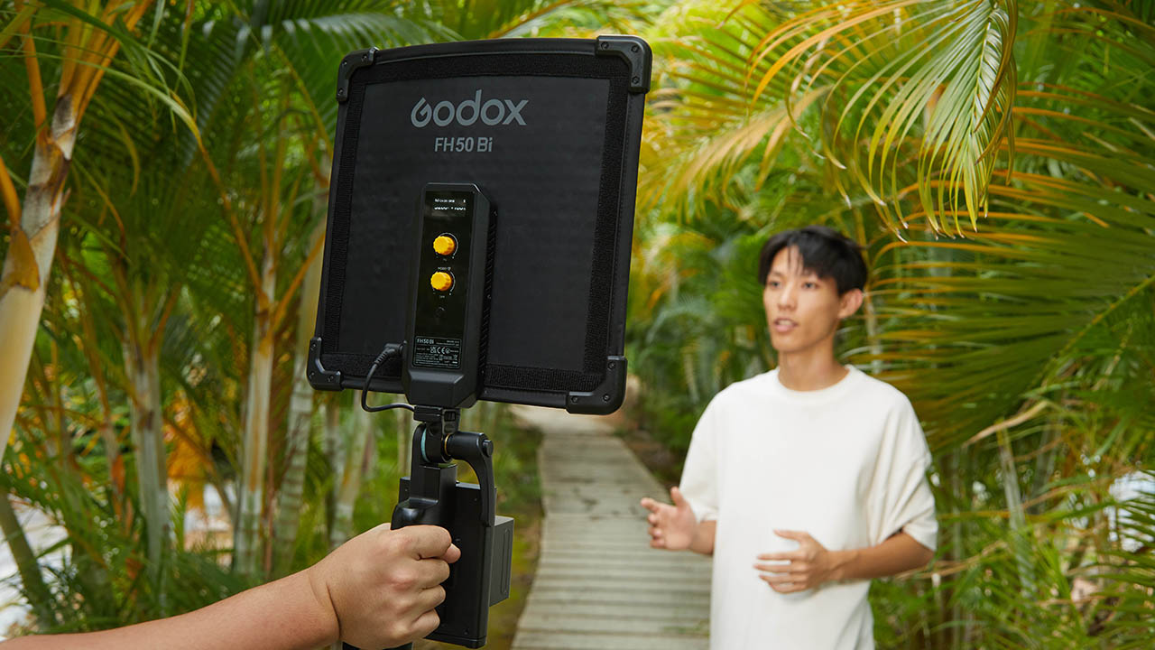 Godox FH50Bi baing used on an outdoor video shoot