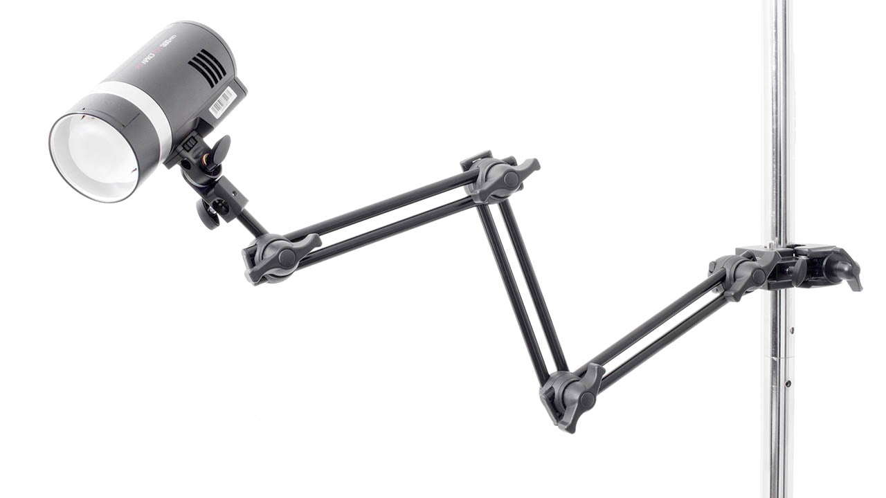 PiXAPRO Double Articulated Extension Arm connected to a super clamp with a flash on the end