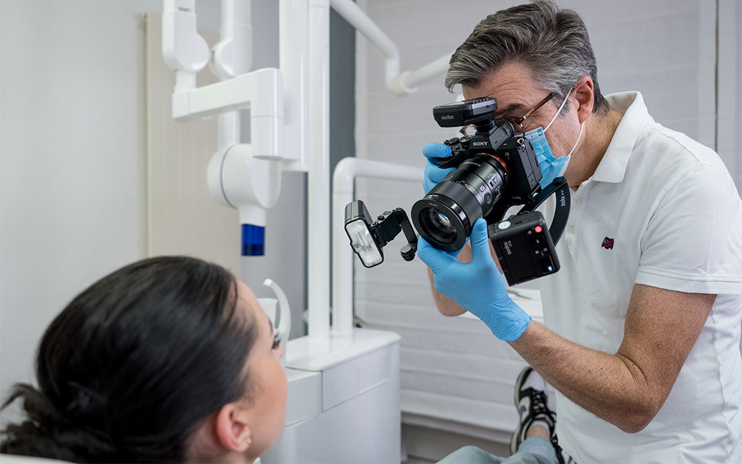 The Godox MF-DB bracket and MF-DK1 Dental flash kit, being used by a Dentist to photograph a patient