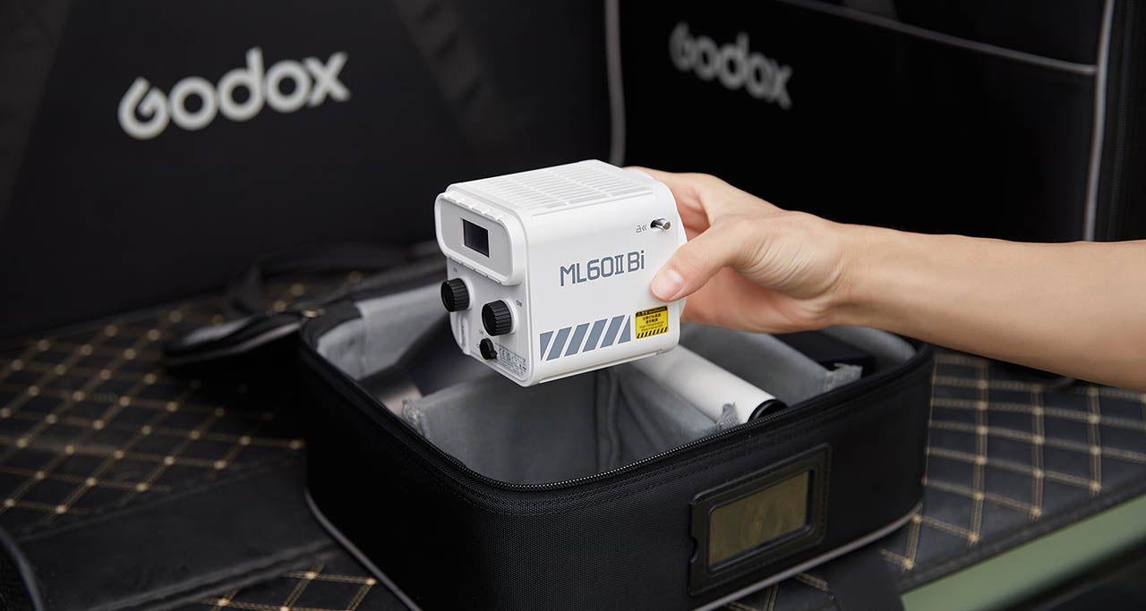 Godox ML60II Bi being placed into its carry case