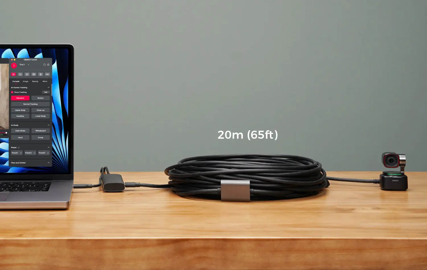 OBSBOT Tiny2 connected to a laptop via  a20m usb-c to usb-a cable