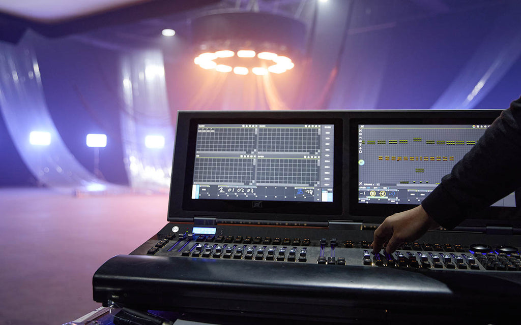 A DMX control console being used on a film set