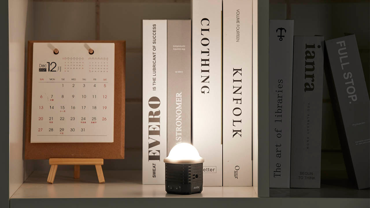 The Godox WL4B on a Bookshelf, showing its high colour fidelity