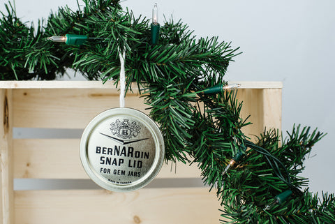 simple ornament made from used Bernardin snap lids for gem jar 