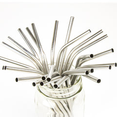 mason jar filled with bent silver stainless steel reusable straws