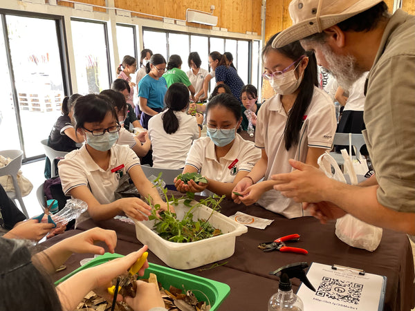Secondary school students from Raffles Girl's School learning about food and agricultural systems in a sustainable farm to table workshop.