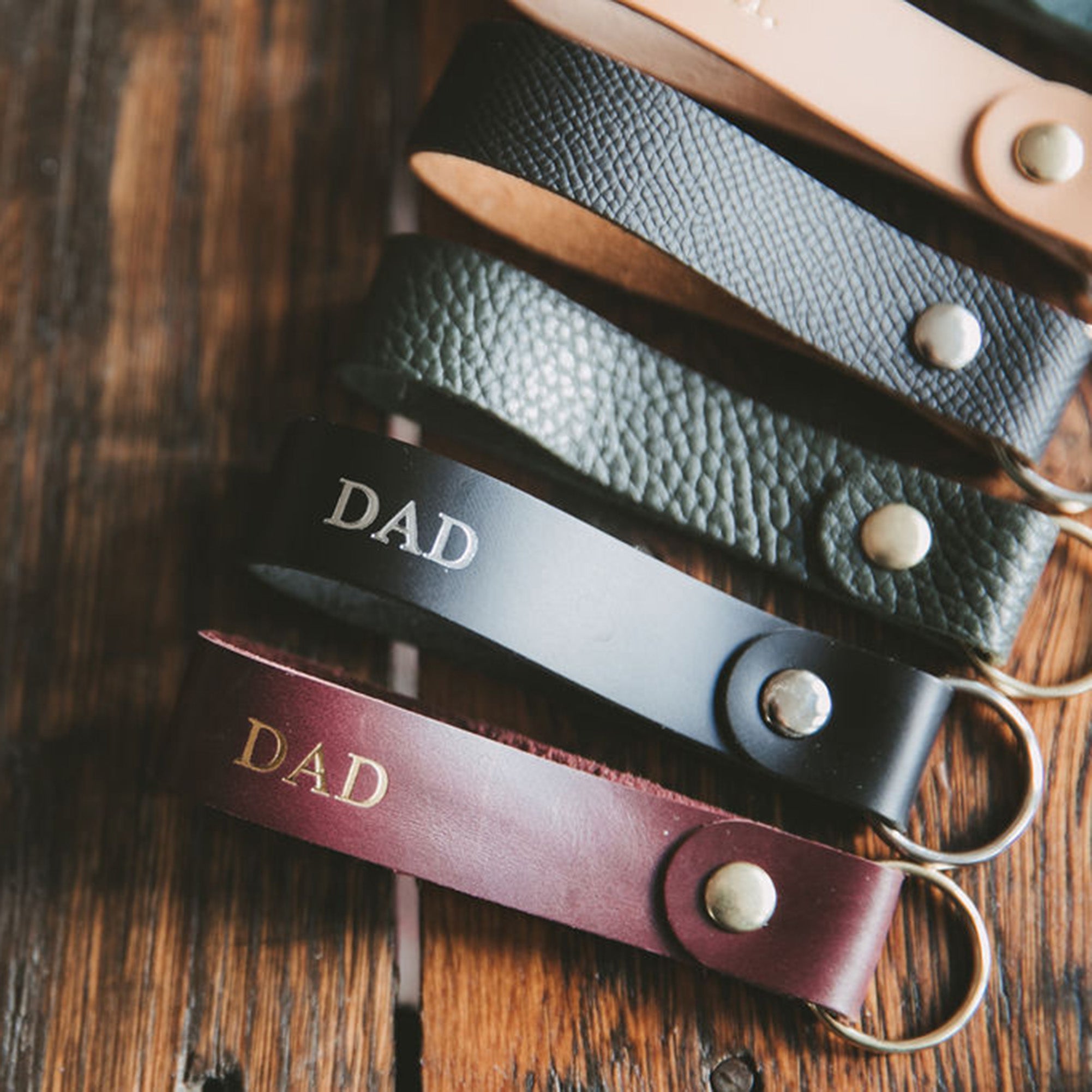 Brown and black personalised leather keyrings for Dad