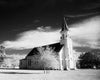 wide angle black and white photo of old church