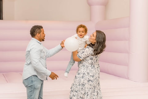 Celebrating Preemie with a Modern Purple Bounce House