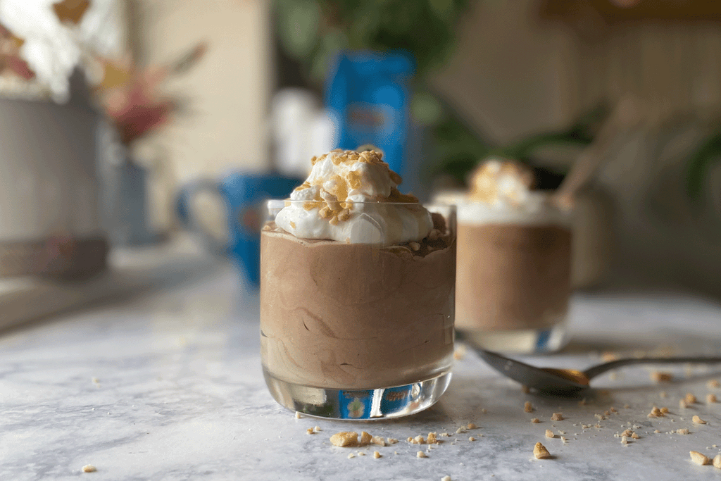 a light and fluffy coffee and chocolate mousse dessert made withkauai coffee honey macadamia nut coffee sits on a countertop.