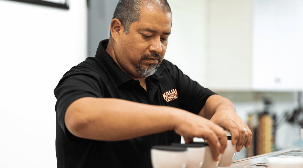 kauai coffee roaster prepares a cupping session to professionally taste coffee