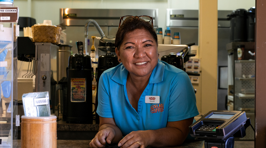 kauai coffee cafe staff serving guests at the cafe window