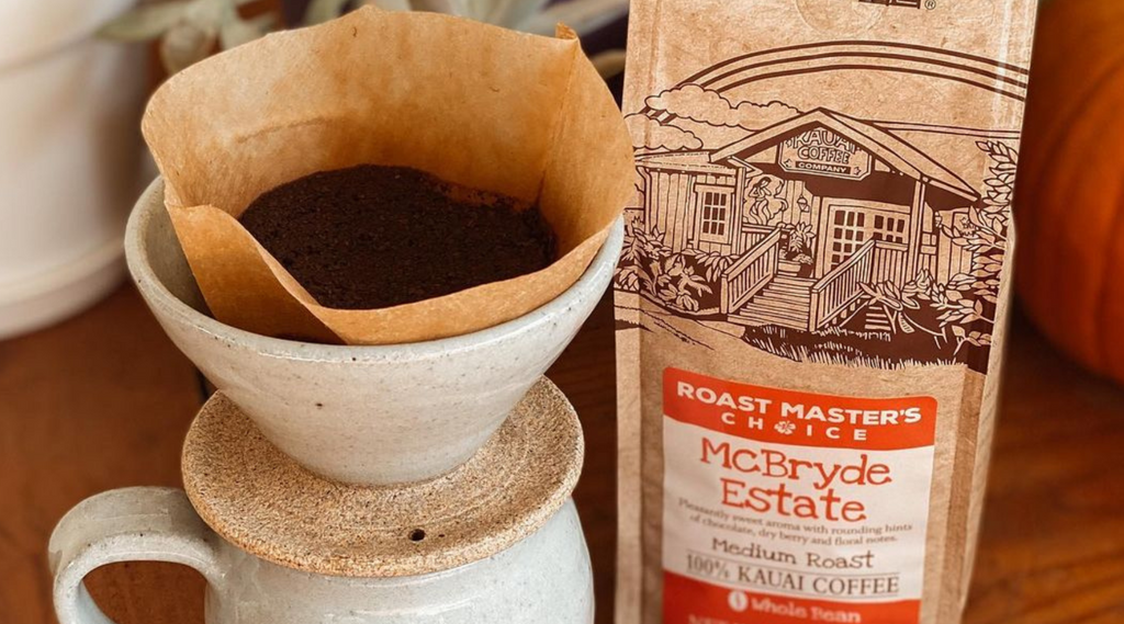 a ceramic pour over filter and a bag of kauai coffee mcbryde estate coffee