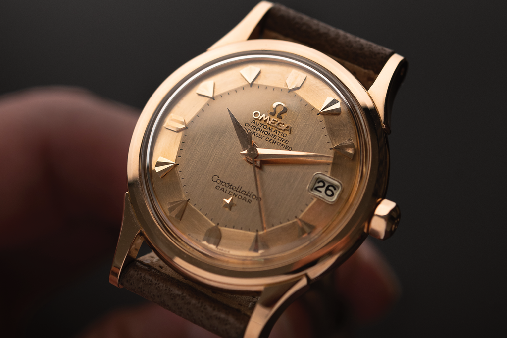 OMEGA's finest from the 1950s. A 1958 Constellation 2943 gold on gold. Perfect finishing of the dial, satin-brushed center, playful arrow and diamond indexes...