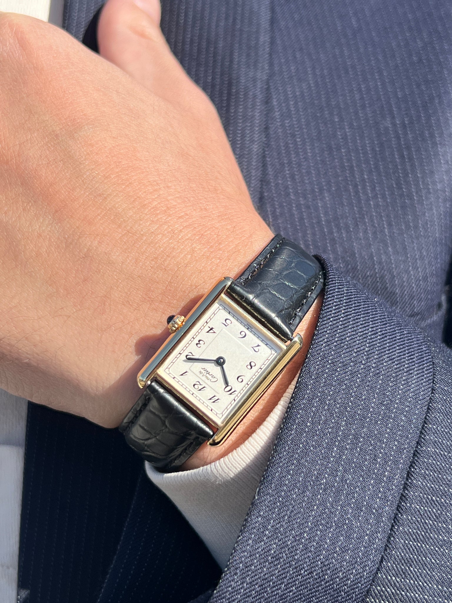 Discontinued Cartier Must Tank with Breguet index. Actual photo of the watch being worn.