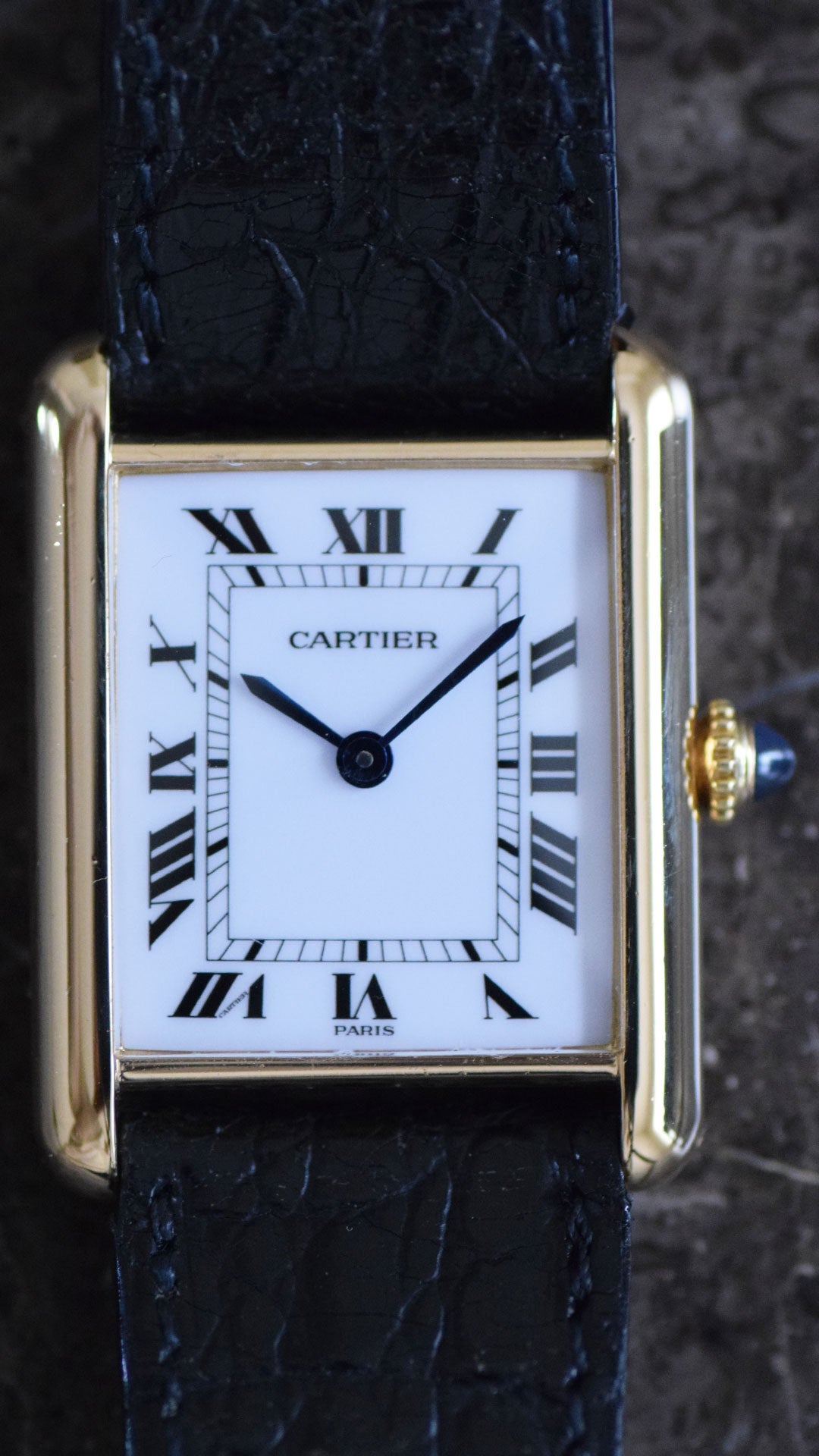 Tank Louis Cartier PARIS dial close-up