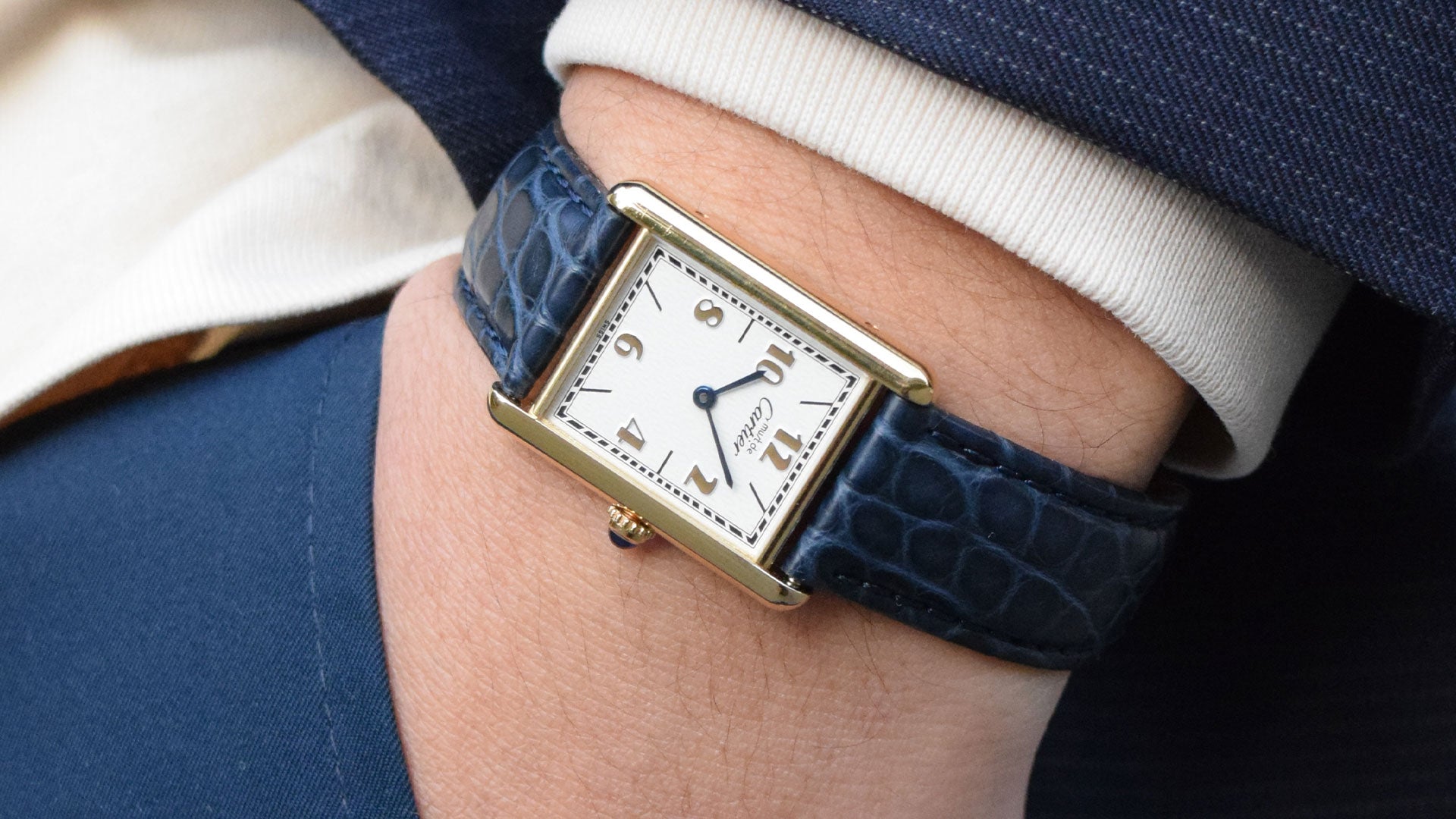 Image of a man wearing a Cartier Must Tank