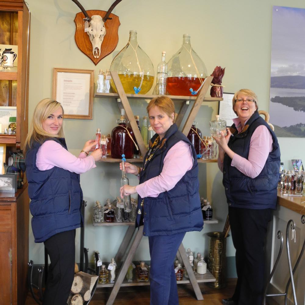 Jan and her Team in Luss General Store with their new Demijohn in-store Concession