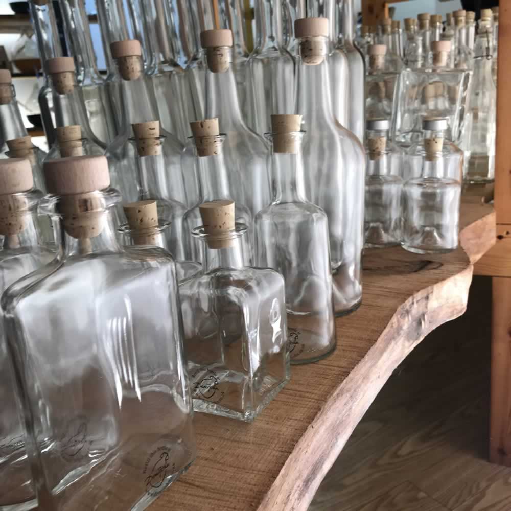 Demijohn glass bottles are both beautiful and refillable