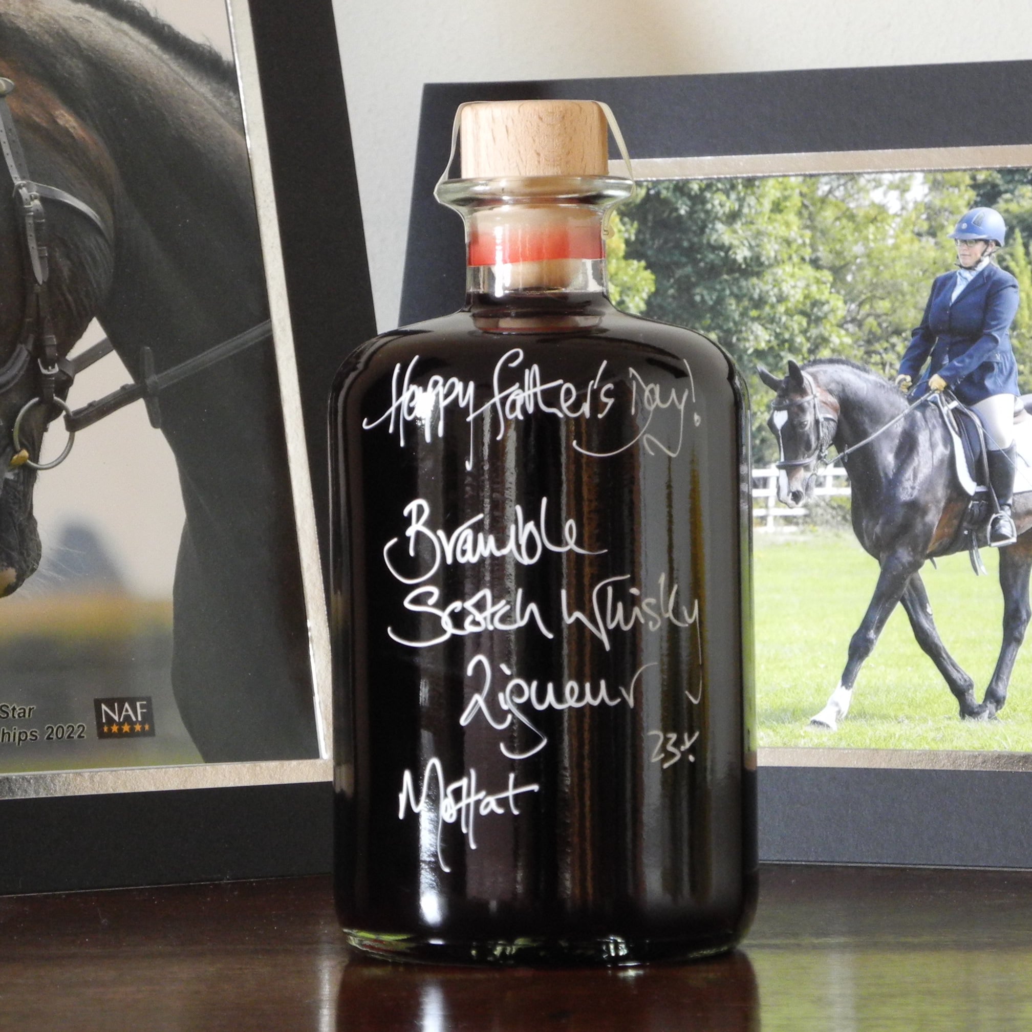 Bottle of Bramble Scotch Whisky Liqueur with handwritten message that says 'Happy Father's Day!'