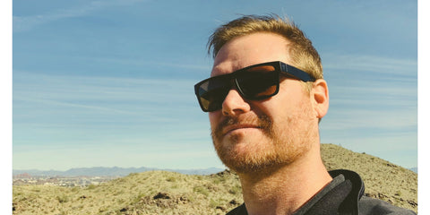 man wearing sunglasses in arizona desert