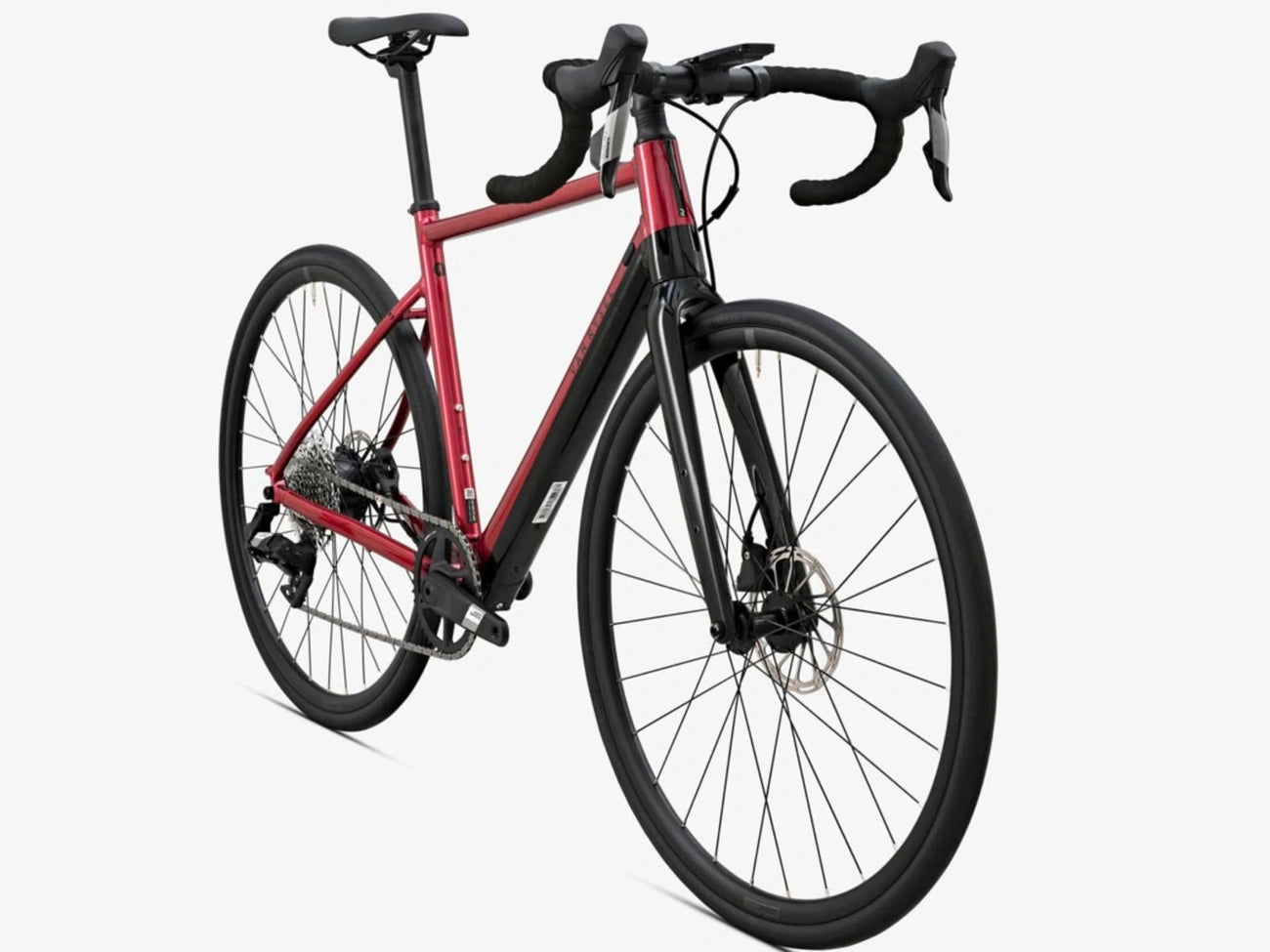 Red road bike with drop handlebars and disc brakes