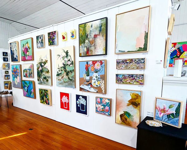 Gallery wall of original artworks for Flourish Art Exhibition by Aspire Gallery Brisbane