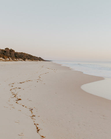 Dreamy pastel sunrise coastal photography of Bribie Island beach, Australia by Australian Artist Kellie Leader for The Confetti Collective Studio