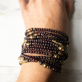 two garnet wraps on model's wrist 