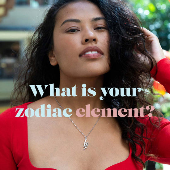 What is your zodiac element? Featuring the flaming hot pendant worn by a model in red for the fire element