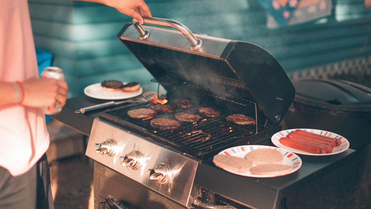 man opening grill