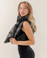 Stay warm in style with this Faux Leather Puffer Vest. Its cropped, fitted silhouette ensures you look fashionable, while the vegan leather and side pockets provide a sophisticated touch