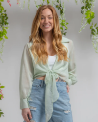 This sage blouse is one of a kind! The fit is the perfect combination of flattering and comfy. You can easily style this blouse with a pair of light denim shorts for a brunch day with your friends!