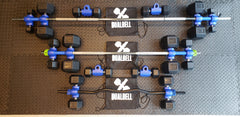 several barbells with dualbells and dumbbells