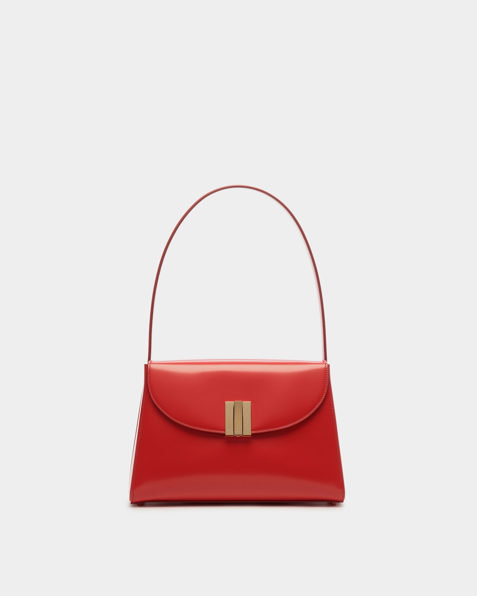 Ollam | Sac d’épaule pour femme en cuir brossé Candy Red | Bally | Still Life Devant