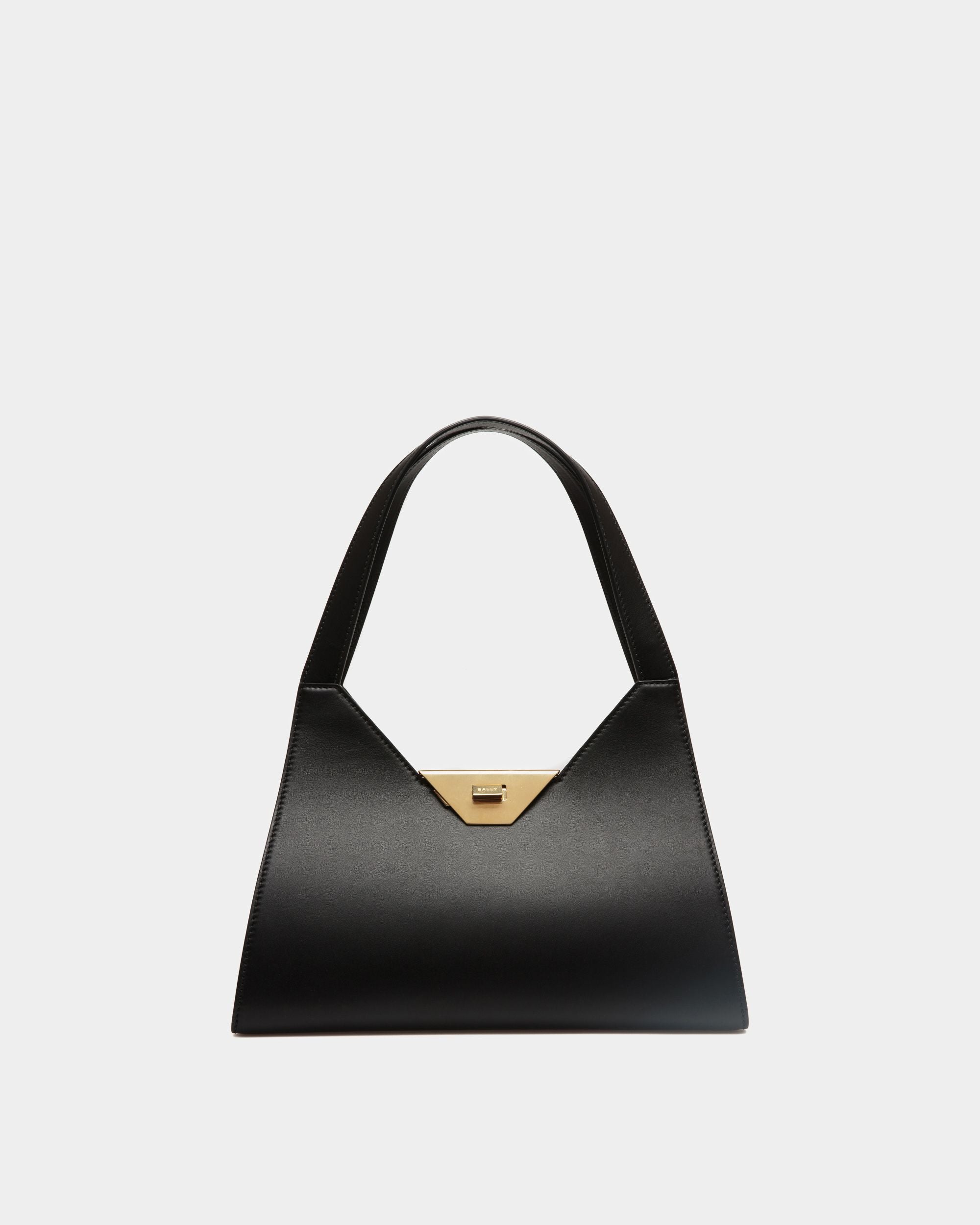 Tilt | Sac d’épaule pour femme en cuir noir | Bally | Still Life Devant