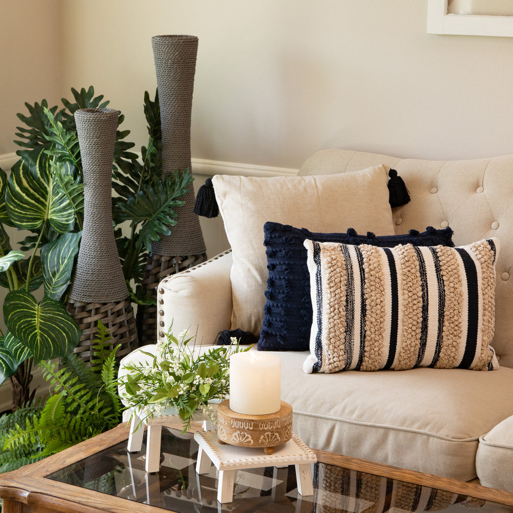 High quality faux greenery next to furniture