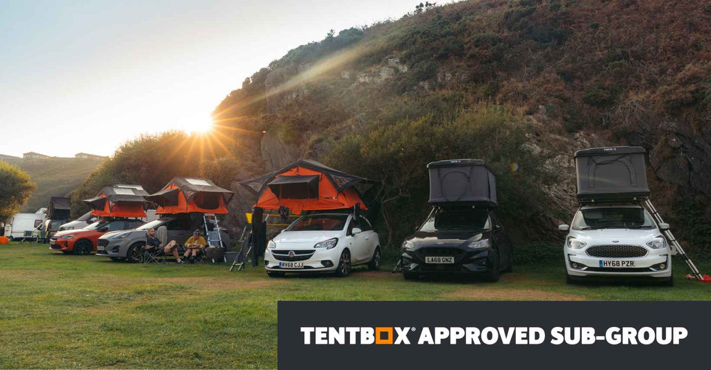 Banner image for TentBox approved sub-groups showing multiple TentBox roof tents mounted on various cars in a camp site near a cliff