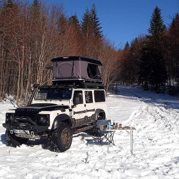 TentBox Classic on jeep in snowy winter scene