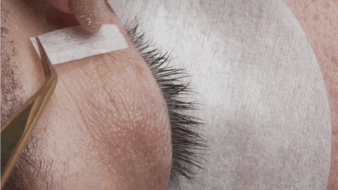 a gif showing how to use tape to lift the eyelid during eyelash extensions treatments | London Lash Australia