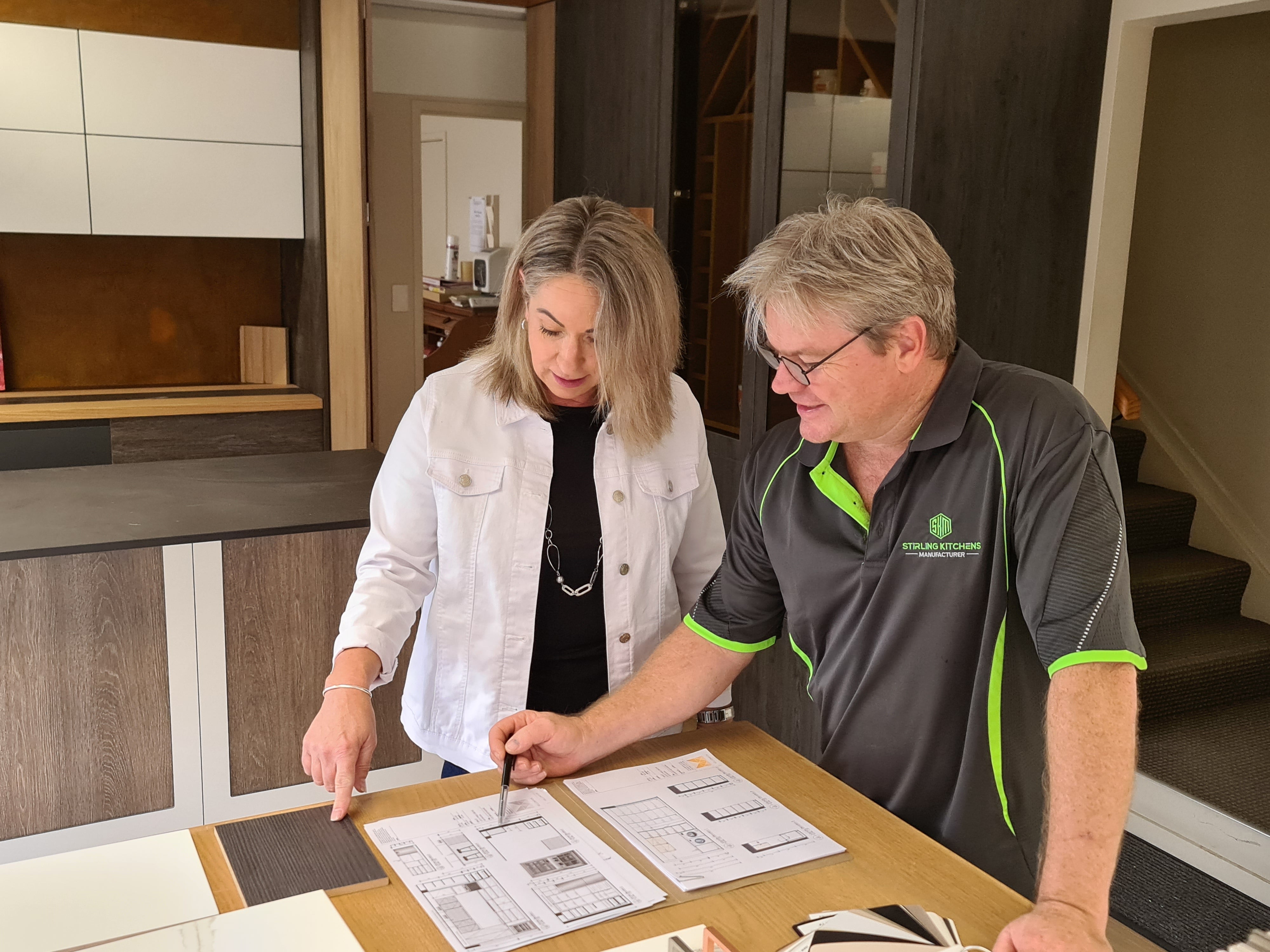 STiRLiNG KiTCHENS Craig Marshall helping a client with her bespoke kitchen renovation options