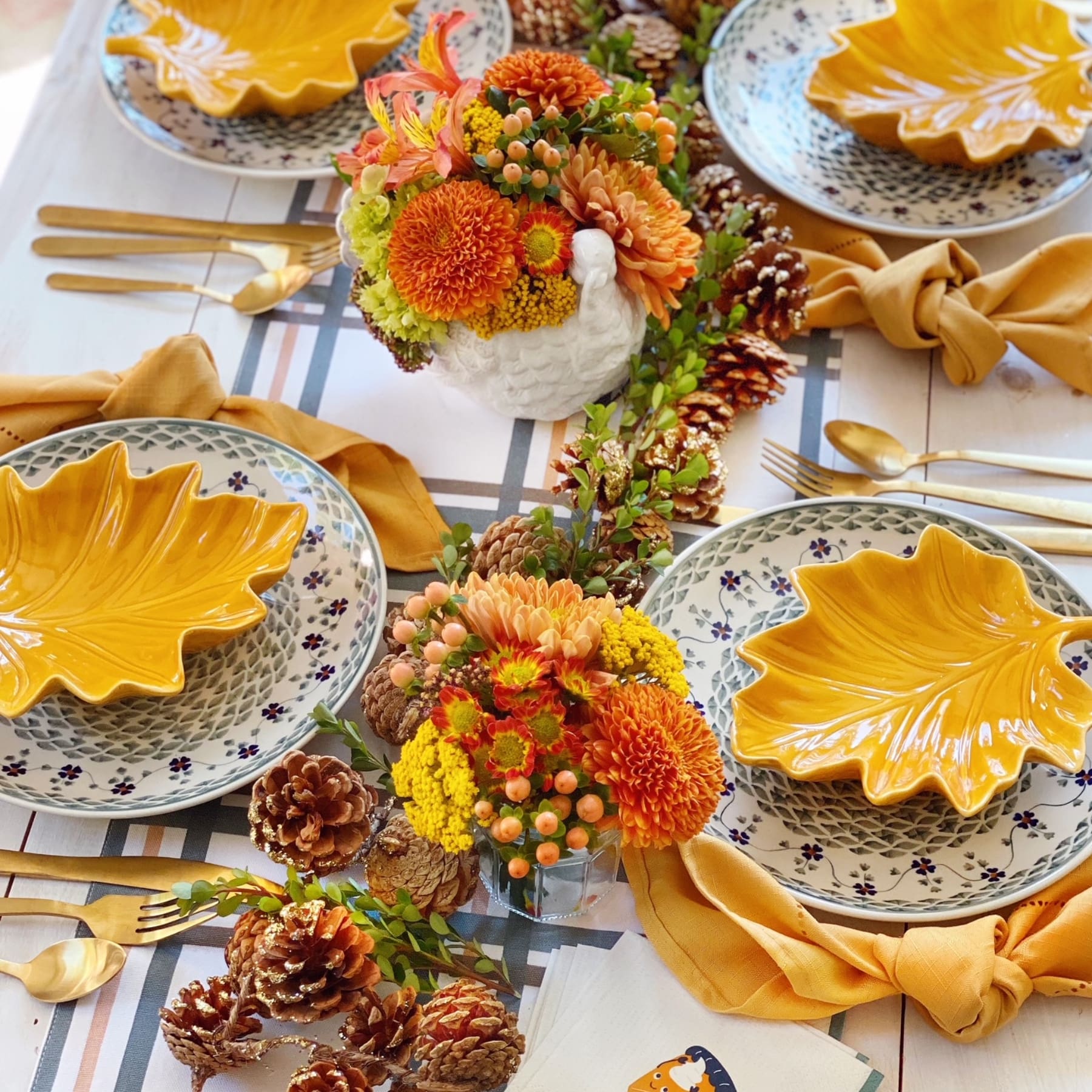 collect colorful leaves acorns and pinecones to scatter along the dining