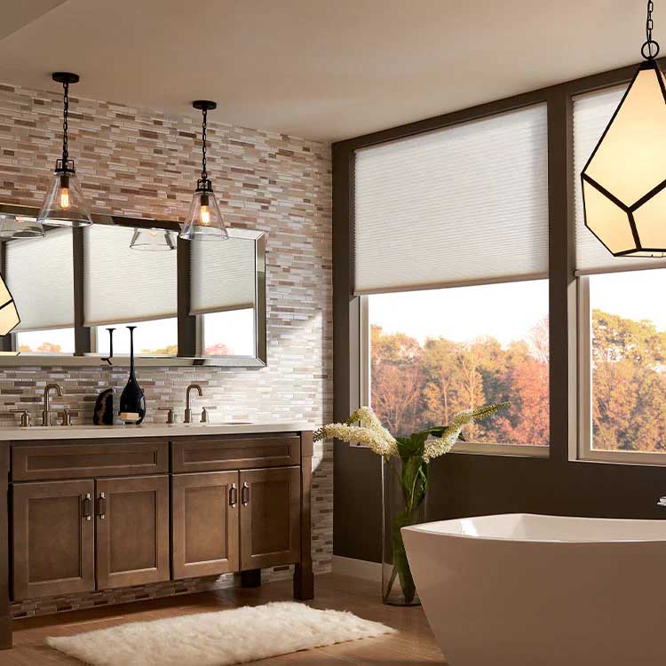 combine exposed bulb and geometric pendants in the bathroom