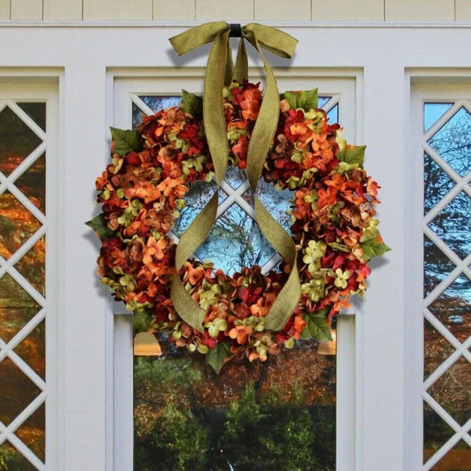 decorate your front door with a fall wreath this simple accent warmly