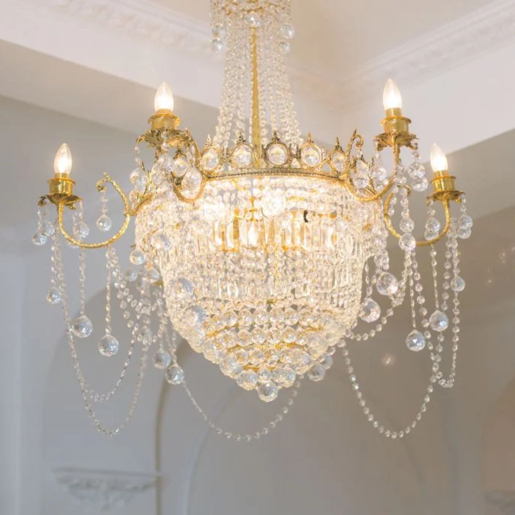 elegant chandeliers sconces and lamps that go beyond mere function can be decorated with luxurious crystal details or feature a more refined wrought iron design to express classic elegance