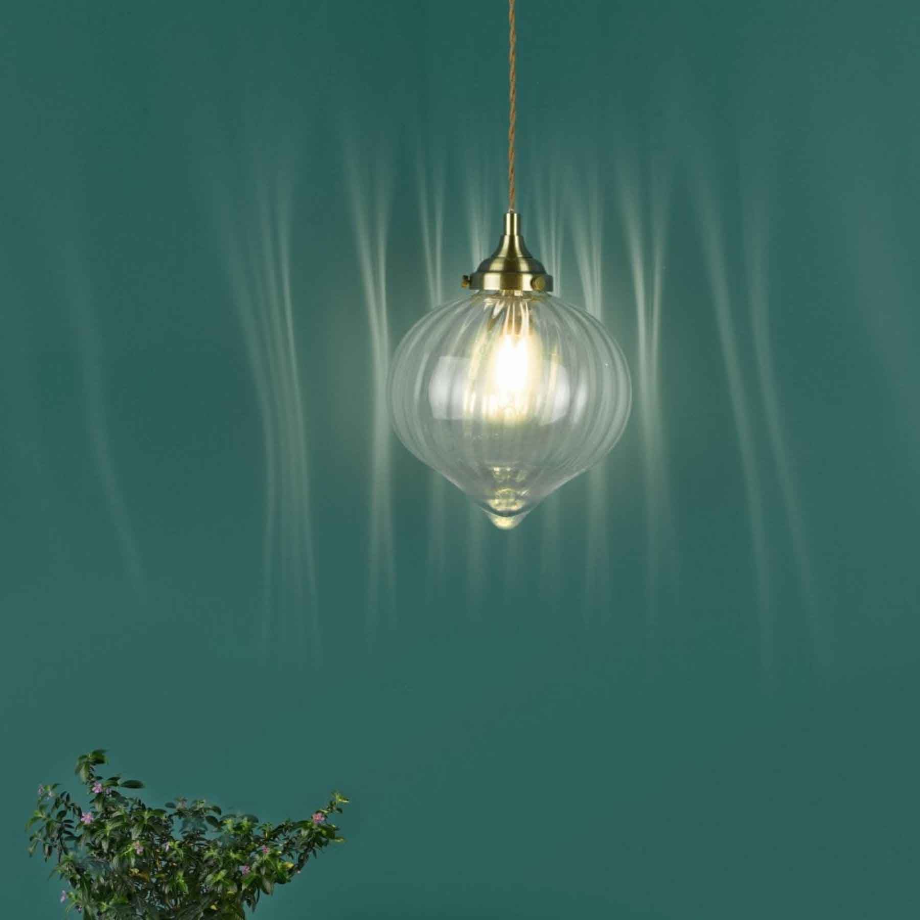 enhanced by antique brass metalwork the mya was initially envisioned as a kitchen pendant light